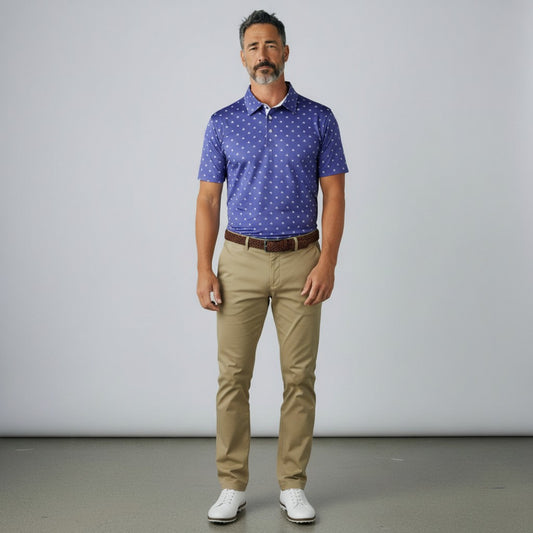 Byron Nelson Carolina Bloom blue patterned performance golf polo shirt worn by a man with khaki trousers.