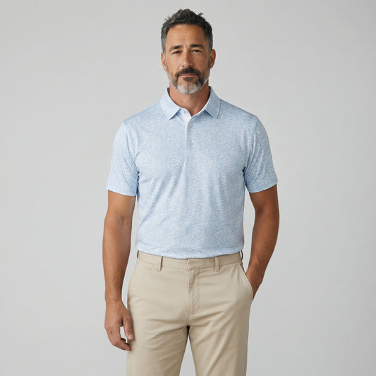 Byron Nelson light blue polo shirt with a subtle dog print, made from polyester and spandex for comfort and breathability.