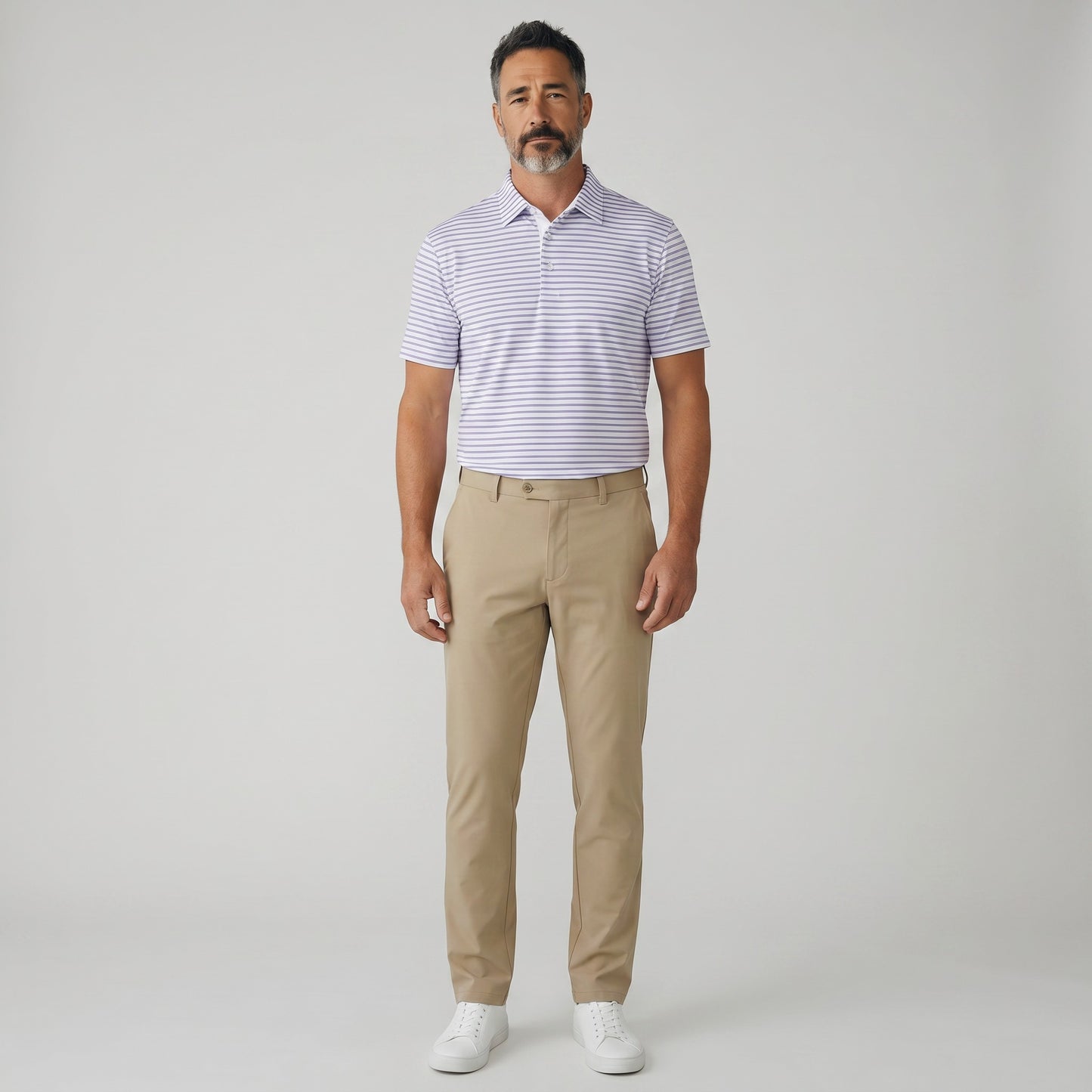 Byron Nelson Pacific Stripe polo shirt in white with purple stripes, made of polyester and spandex blend. Tailored fit.
