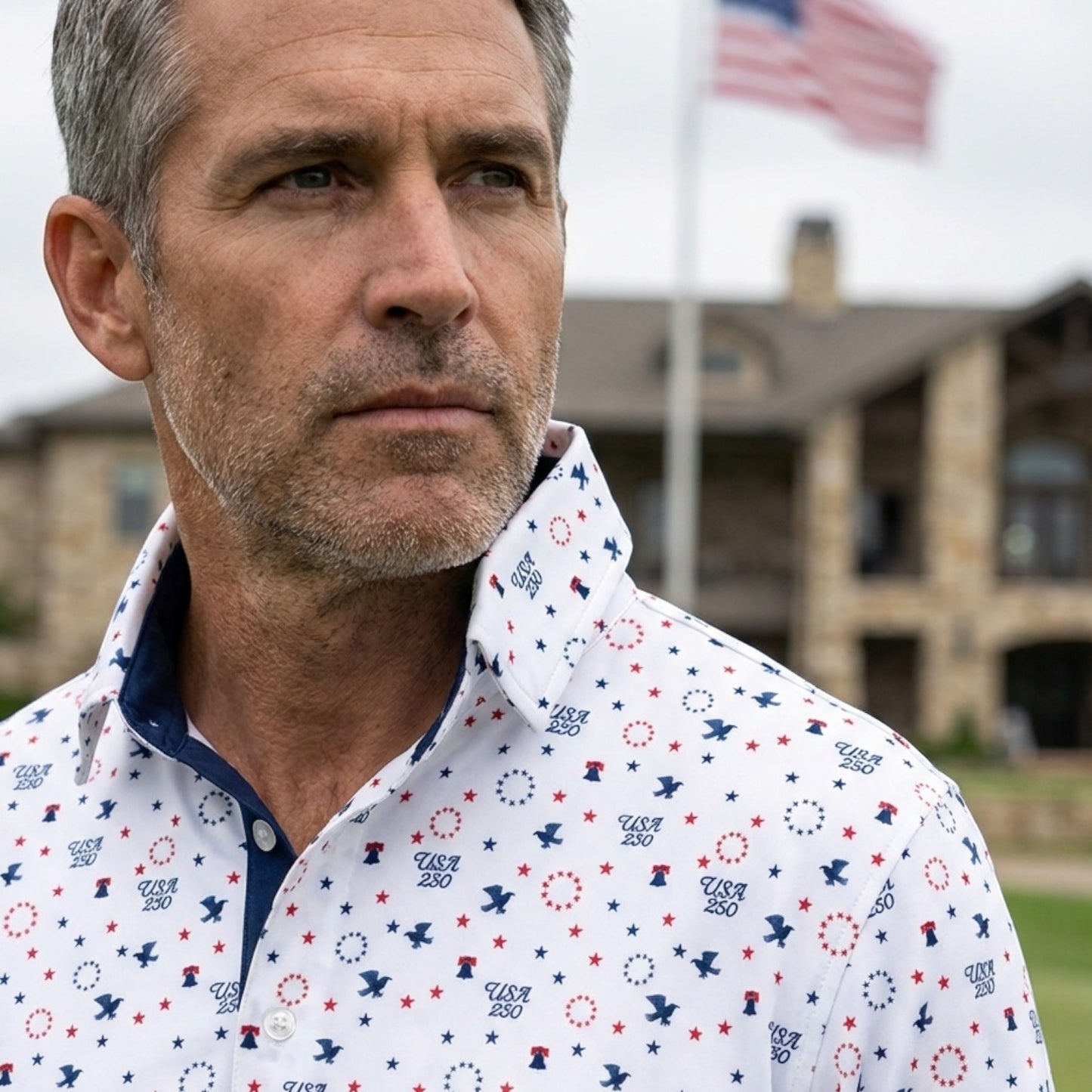 Byron Nelson white polo shirt with USA 250th Anniversary patriotic print, featuring red stars, blue eagles, and Liberty Bells. Moisture-wicking polyester-spandex blend.