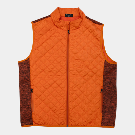 Byron Nelson Highland Hybrid Vest in bright orange with a quilted front, stand collar, and dark stretch side panels.