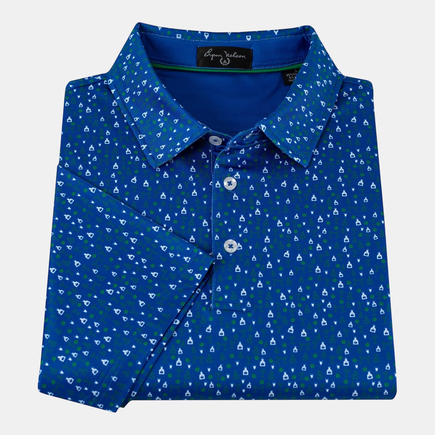Byron Nelson 19th Pour blue golf polo with tequila print, moisture-wicking stretch fabric.