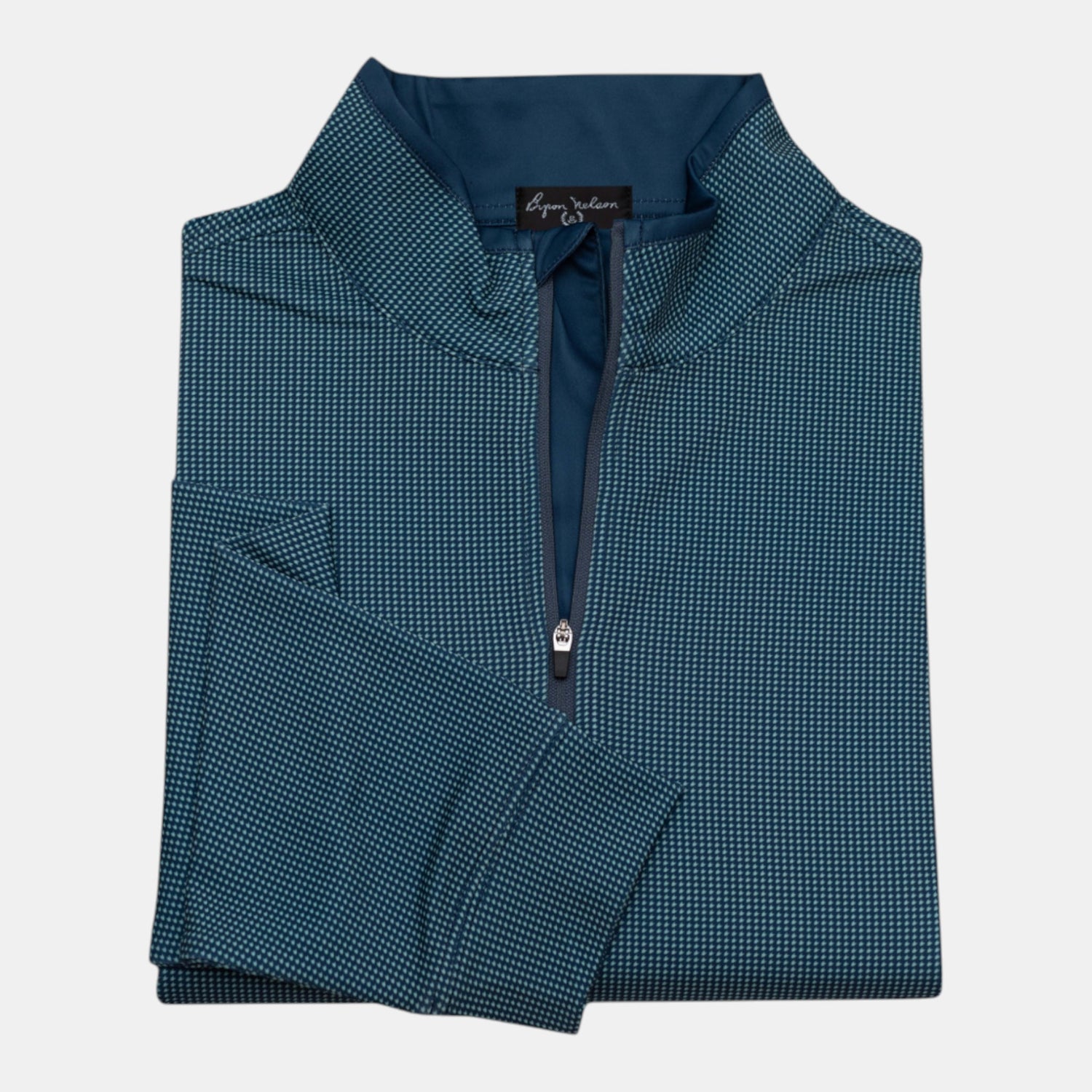Byron Nelson Ace Layer 1/4 Zip pullover in teal with a subtle dot pattern, made from polyester-spandex blend.
