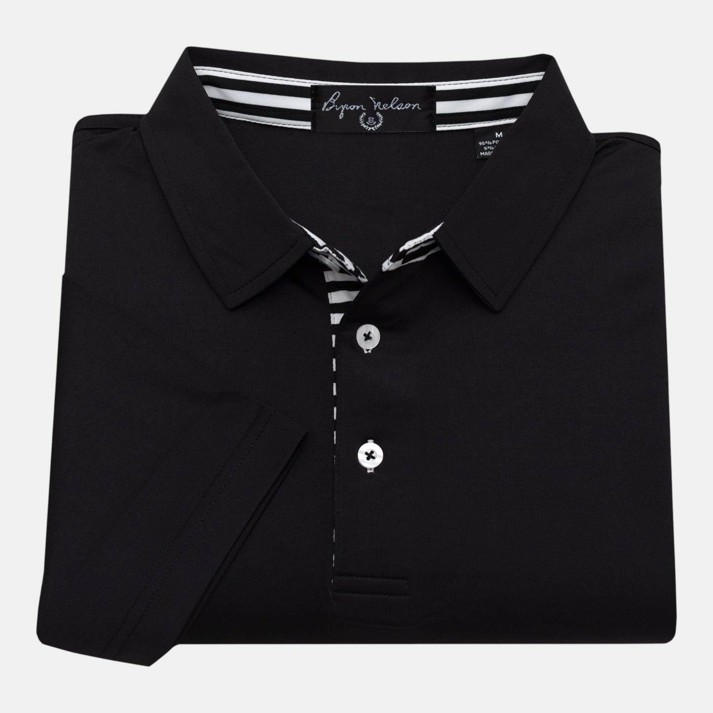 Byron Nelson black performance polo shirt with striped placket and neck band. 95% Polyester, 5% Spandex.