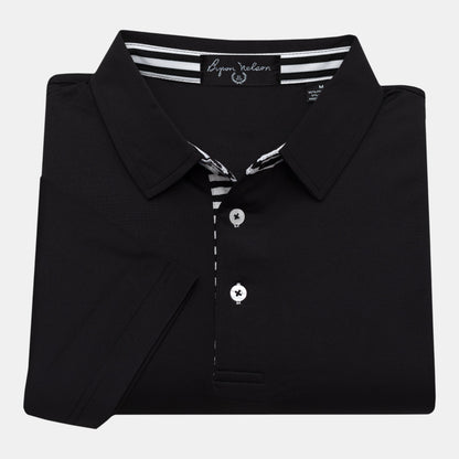 Byron Nelson black performance polo shirt with striped placket and neck band. 95% Polyester, 5% Spandex.