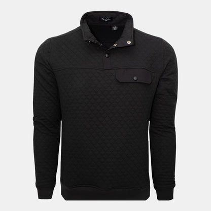 Byron Nelson black quilted pullover with snap placket, chest pocket, and ribbed cuffs. Cotton-polyester blend.