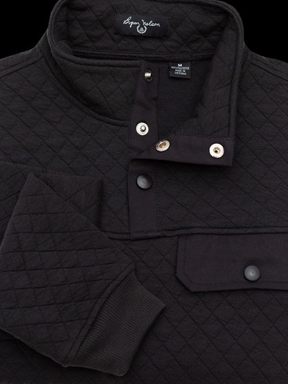 Byron Nelson black quilted pullover with diamond pattern, snap placket, chest pocket, and ribbed cuffs. Cotton-polyester blend.