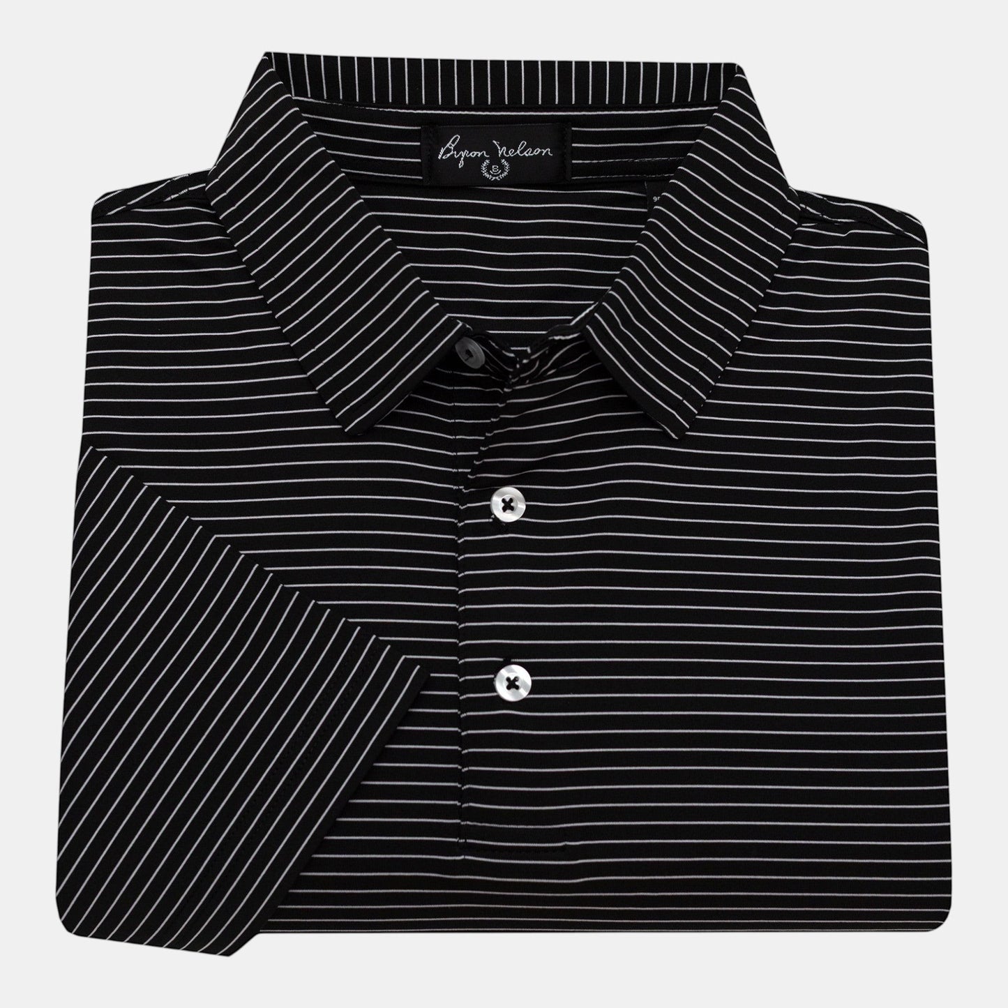 Byron Nelson black and white striped polo shirt, 95% polyester/5% spandex blend, moisture-wicking, four-way stretch.