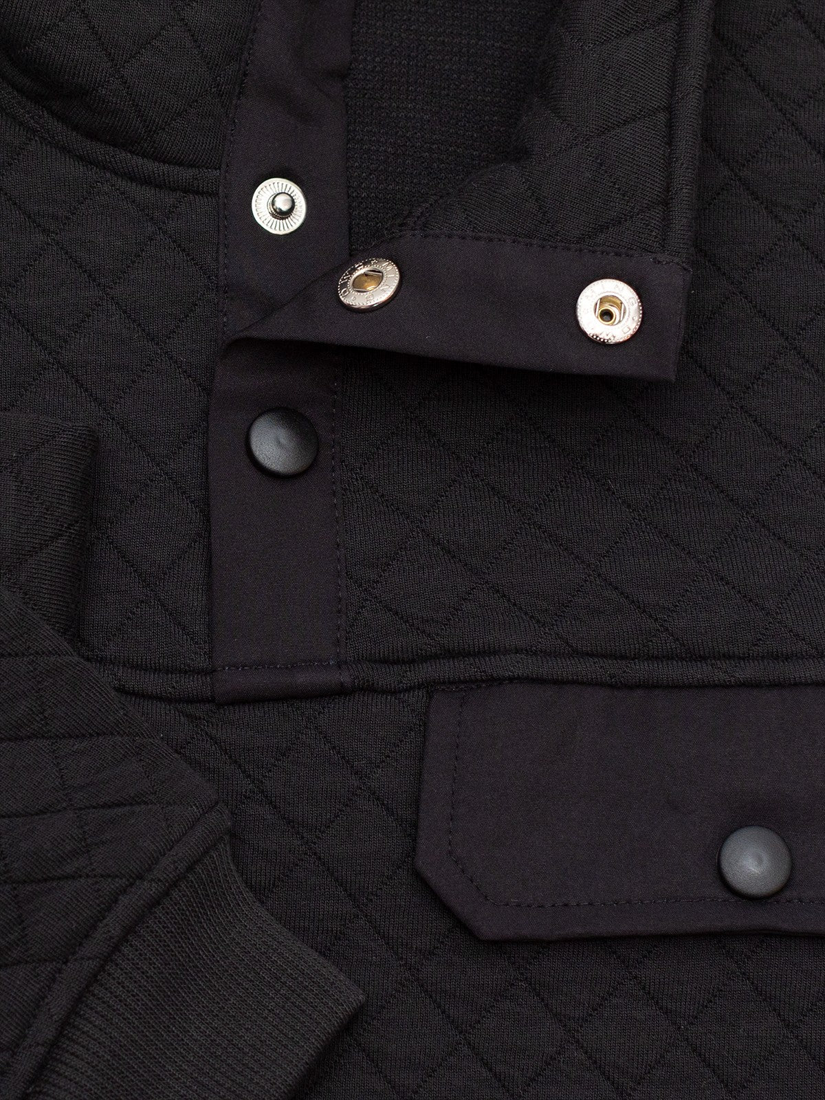 Byron Nelson Carolina Quilted Pullover in black, featuring diamond quilting, snap placket, and chest pocket. Cotton-polyester blend.