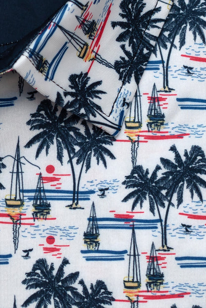 Byron Nelson white polo with navy palm trees, sailboats, and red sunset print. Moisture-wicking polyester-spandex blend.
