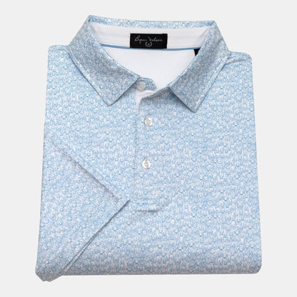 Byron Nelson light blue polo shirt with an all-over white dog print, short sleeves, and button collar.