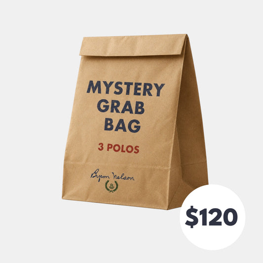 Byron Nelson mystery grab bag made of brown paper containing three premium polo shirts