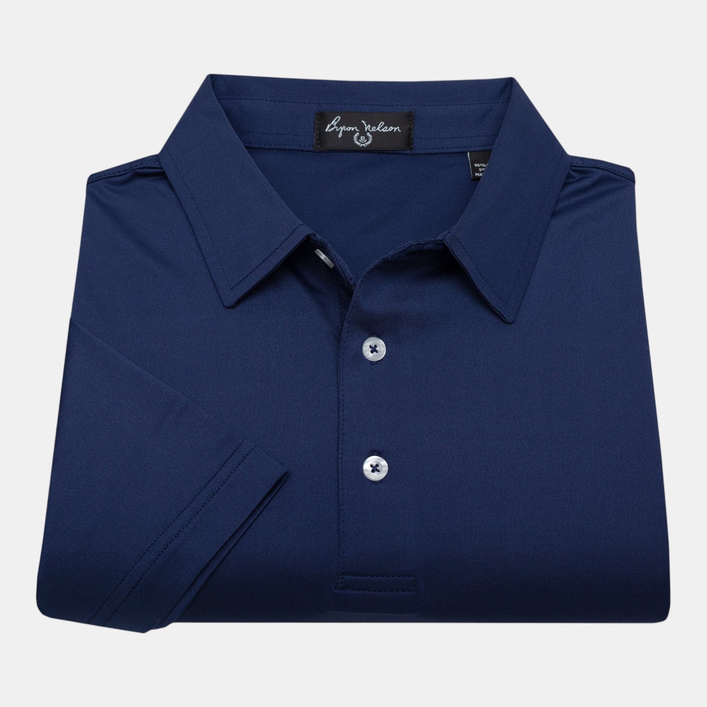Byron Nelson navy blue short-sleeve polo shirt made from polyester and spandex jersey with a soft, moisture-wicking feel.