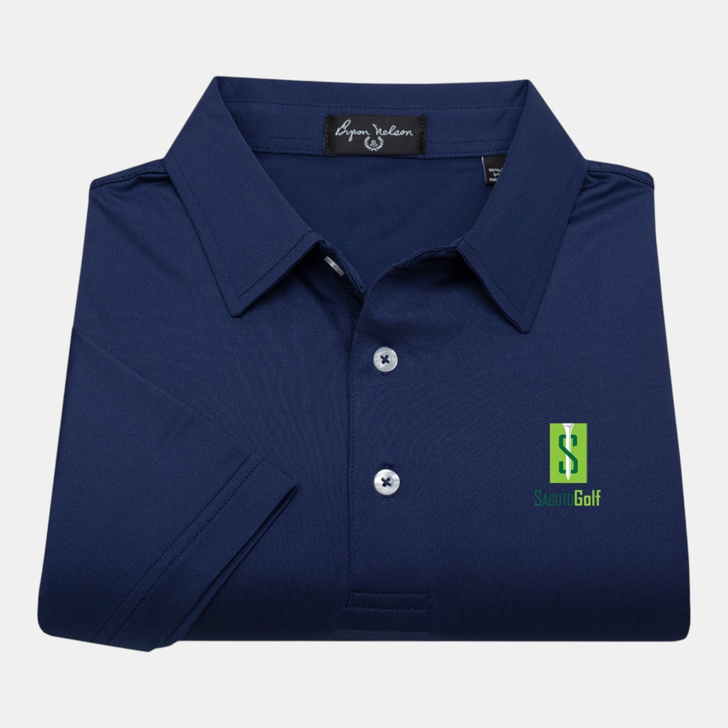 Byron Nelson navy blue polyester-spandex polo shirt with Saguto Golf logo, moisture-wicking and stretch fabric.