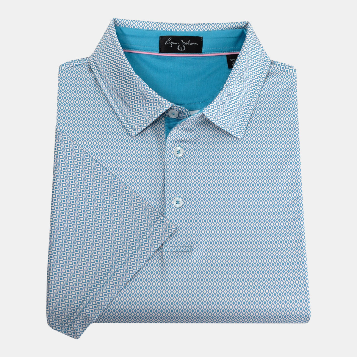 Byron Nelson sea glass polo shirt with a geometric diamond pattern, classic collar, and moisture-wicking fabric.