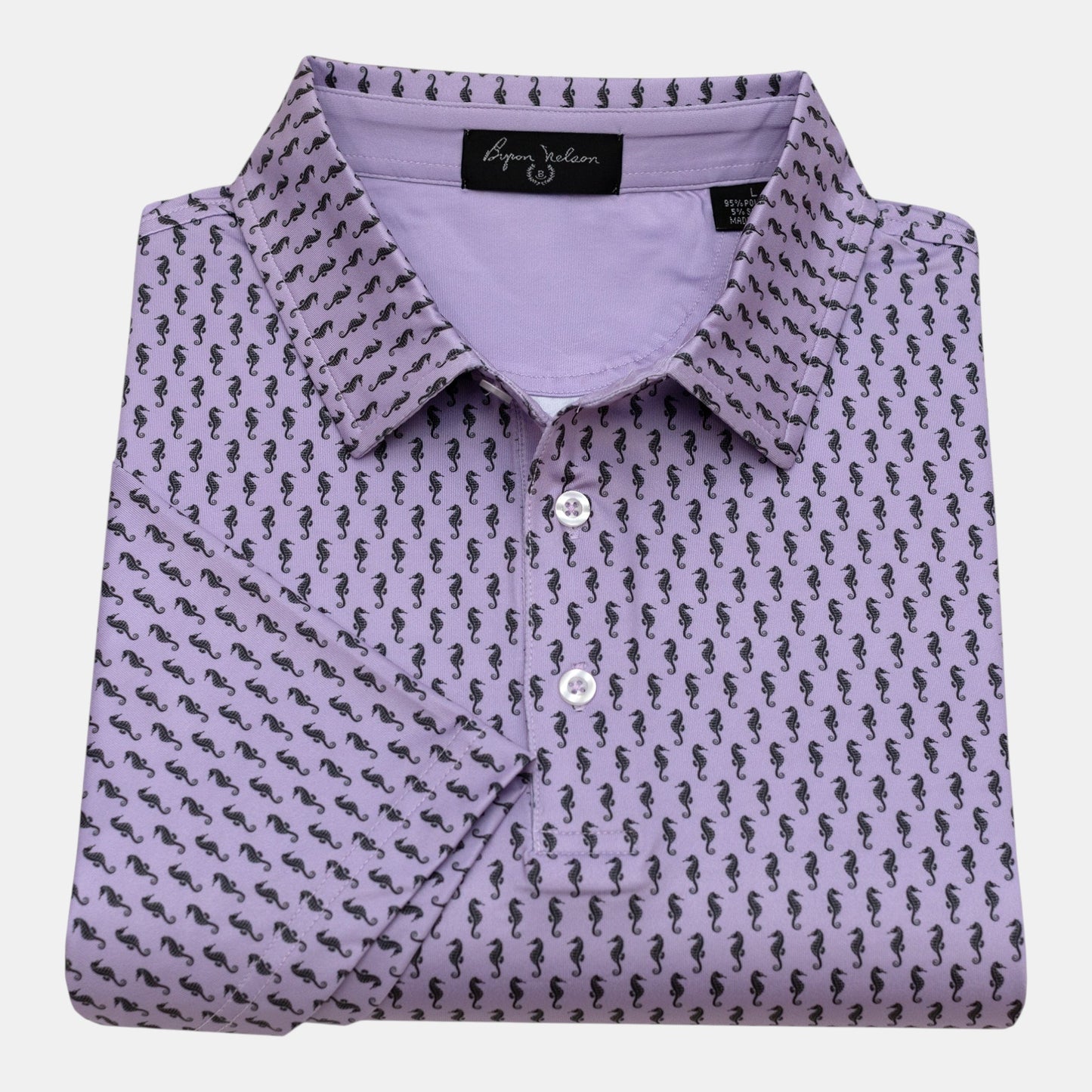 Byron Nelson lavender polo shirt with all-over black seahorse print, performance fabric, and button collar.
