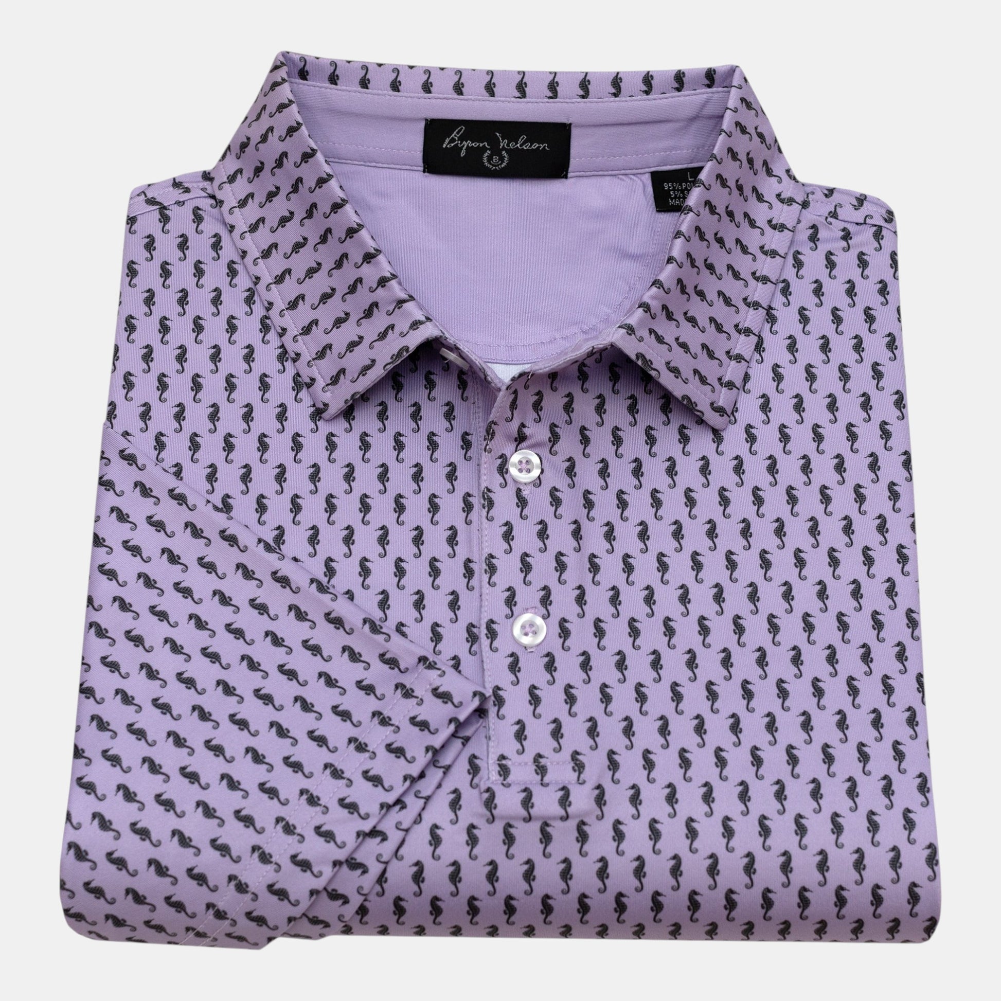 Byron Nelson lavender polo shirt with all-over black seahorse print, performance fabric, and button collar.