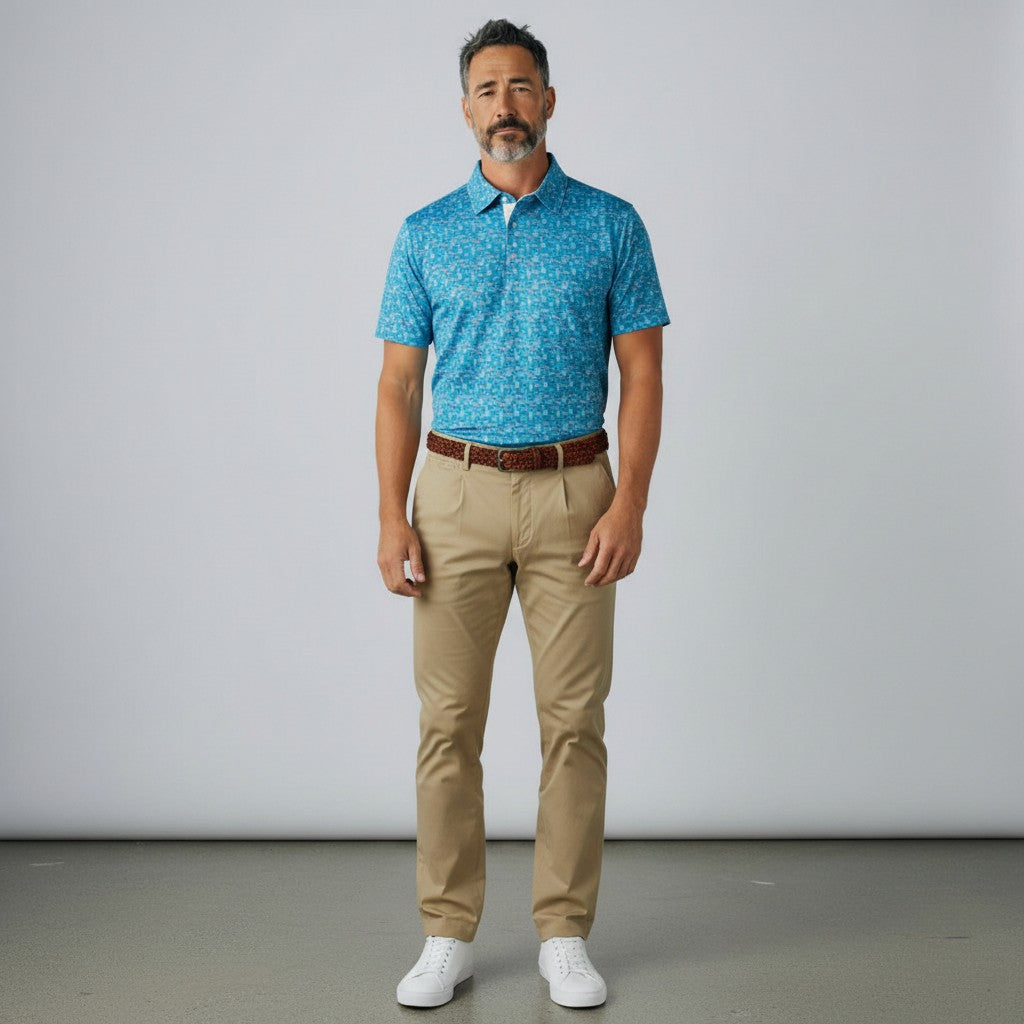 Byron Nelson Shipyard Polo in blue with a patterned stripe design, worn by a man with khaki trousers and white shoes.
