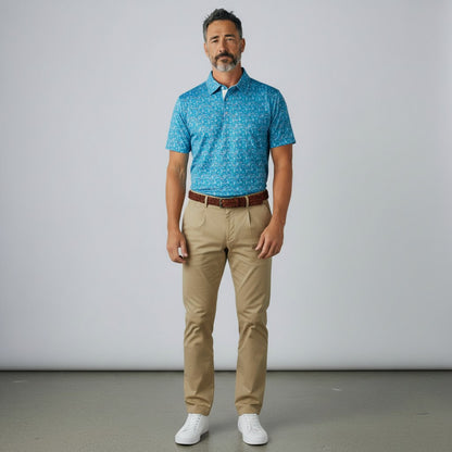 Byron Nelson Shipyard Polo in blue with a patterned stripe design, worn by a man with khaki trousers and white shoes.