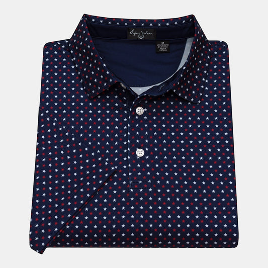 Byron Nelson navy blue polo shirt with a red and white star print. Made of polyester and spandex with moisture-wicking fabric.