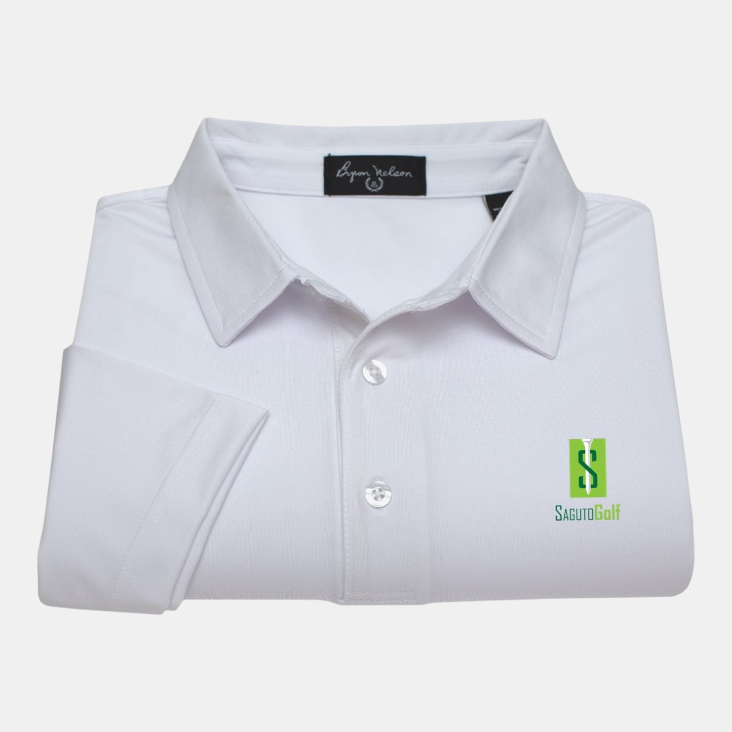 Byron Nelson white polyester-spandex polo shirt with green Saguto Golf logo on chest, moisture-wicking fabric.